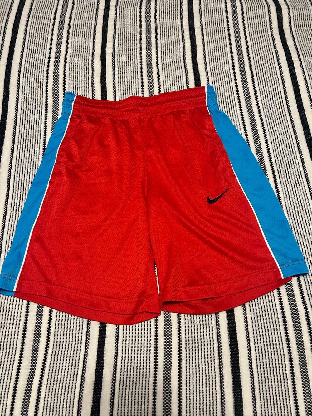 Nike Women’s Red Athletic Shorts with Blue Side Panels